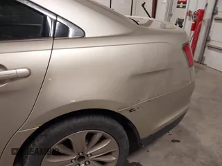 2010 Ford Taurus Limited with VIN 1FAHP2FW9AG133764, listed as a IAAI auction lot 41823527 with 243,477 mi miles and . Bid and sale history available at DreamBid. Image 19.