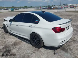 2015 BMW M3 with VIN WBS3C9C55FP806151, listed as a IAAI auction lot 41934925 with 58,071 mi miles. Bid and sale history available at carsss.com. Image 3.