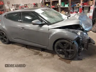 2016 Hyundai Veloster with VIN KMHTC6AD8GU267426, listed as a IAAI auction lot 41349385 with 114,245 mi miles. Bid and sale history available at carsss.com. Image 1.