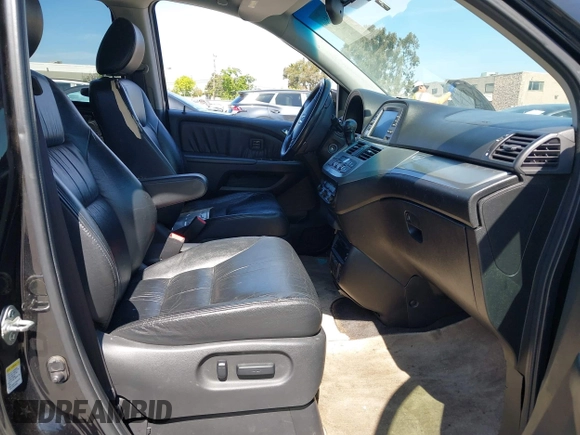 2008 Honda Odyssey Touring with VIN 5FNRL38948B116432, listed as a IAAI auction lot 42162566 with 121,996 mi miles. Bid and sale history available at carsss.com. Image 5.