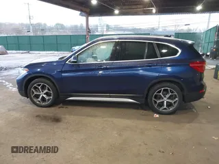 2019 BMW X1 xDrive28i with VIN WBXHT3C55K5L37338, listed as a IAAI auction lot 41934461 with 87,913 mi miles. Bid and sale history available at carsss.com. Image 14.