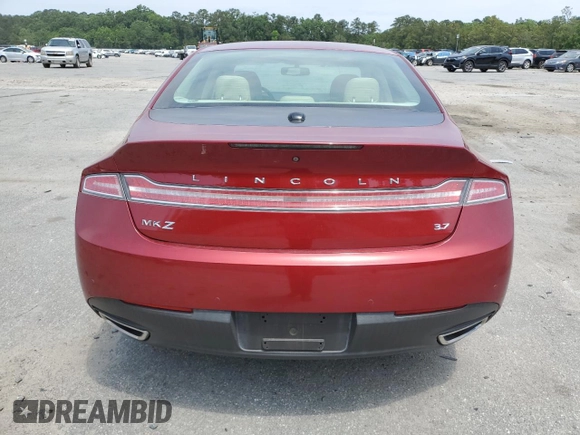 2014 Lincoln MKZ z VIN 3LN6L2GK4ER825465, wystawiony jako Copart lot #55911345 z przebiegiem 78 783 mil mil oraz Szkoda całkowita • Salvage title. Historia ofert i sprzedaży dostępna na DreamBid. Obrazek 6.