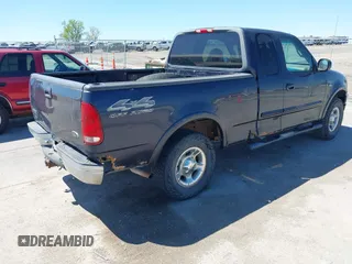 2000 Ford F-150 XL with VIN 1FTRX18LXYNB41132, listed as a IAAI auction lot 42173717 with Not provided miles and . Bid and sale history available at DreamBid. Image 4.