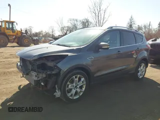2016 Ford Escape Titanium with VIN 1FMCU9JX5GUA65412, listed as a IAAI auction lot 41859123 with 80,208 mi miles and . Bid and sale history available at DreamBid. Image 18.