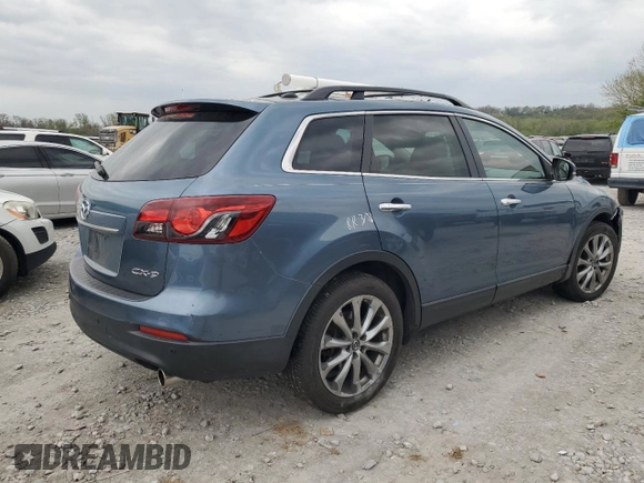 2015 Mazda CX-9 Grand Touring z VIN JM3TB2DAXF0448042, wystawiony jako Copart lot #53620085 z przebiegiem 134 386 mil mil oraz Szkoda całkowita • Salvage title. Historia ofert i sprzedaży dostępna na DreamBid. Obrazek 3.