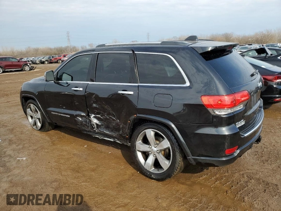2016 Jeep Grand Cherokee Overland with VIN 1C4RJFCG8GC402339, listed as a Copart auction lot 47553385 with 121,486 mi miles and Salvage title. Bid and sale history available at DreamBid. Image 2.