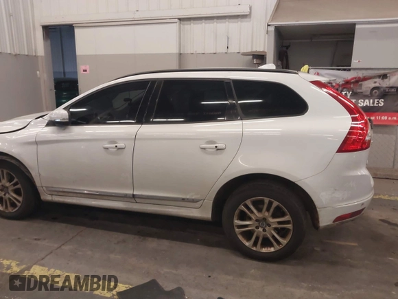 2016 Volvo XC60 T5 Drive-E z VIN YV440MDJ0G2920301, wystawiony jako IAAI lot #40956289 z przebiegiem 137 565 mil mil oraz . Historia ofert i sprzedaży dostępna na DreamBid. Obrazek 15.