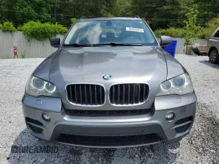 2012 BMW X5 35i with VIN 5UXZV4C50CL991452, listed as a Copart auction lot 56890265 with 147,019 mi miles and Salvage title. Bid and sale history available at DreamBid. Image 5.