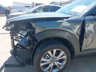 2022 Mazda CX-30 S Premium with VIN 3MVDMBDL5NM416649, listed as a IAAI auction lot 41990745 with 13,923 mi miles and . Bid and sale history available at DreamBid. Image 19.
