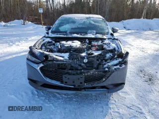 2025 Mazda 3 S Preferred with VIN JM1BPACM0S1751024, listed as a Copart auction lot 86953184 with 10,897 mi miles and Salvage Title. Bid and sale history available at DreamBid. Image 5.