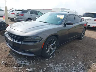 2015 Dodge Charger SXT with VIN 2C3CDXHG7FH886502, listed as a IAAI auction lot 42072027 with 105,034 mi miles and . Bid and sale history available at DreamBid. Image 2.