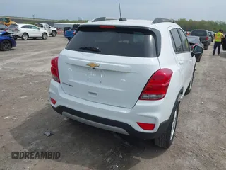 2021 Chevrolet Trax LT with VIN KL7CJPSM5MB369530, listed as a IAAI auction lot 42146885 with 21,906 mi miles and . Bid and sale history available at DreamBid. Image 4.