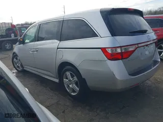 2013 Honda Odyssey Touring with VIN 5FNRL5H97DB021403, listed as a IAAI auction lot 41606606 with 223,547 mi miles. Bid and sale history available at carsss.com. Image 3.