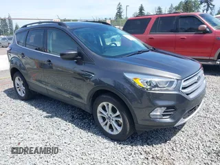 2017 Ford Escape SE z VIN 1FMCU9G99HUE48621, wystawiony jako IAAI lot #42171602 z przebiegiem 95 179 mil mil oraz . Historia ofert i sprzedaży dostępna na DreamBid. Obrazek 1.