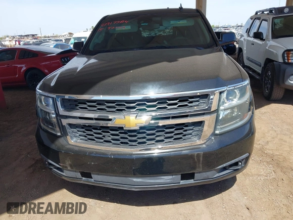2015 Chevrolet Tahoe Commercial z VIN 1GNLC2EC0FR629983, wystawiony jako IAAI lot #41917584 z przebiegiem 111 461 mil mil oraz . Historia ofert i sprzedaży dostępna na DreamBid. Obrazek 12.
