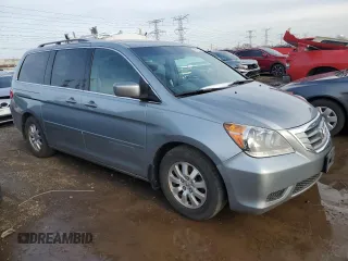 2010 Honda Odyssey EX-L with VIN 5FNRL3H69AB001952, listed as a Copart auction lot 49738155 with 95,721 mi miles and Salvage Title. Bid and sale history available at carsss.com. Image 4.