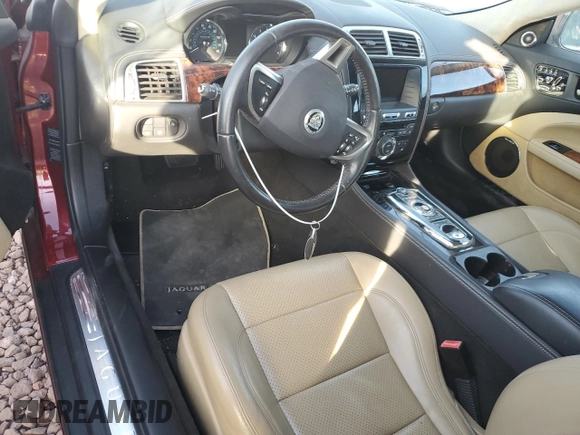 2013 Jaguar XK with VIN SAJWA4GB0DLB50530, listed as a Copart auction lot 82715724 with 24,634 mi miles and Salvage Title. Bid and sale history available at carsss.com. Image 8.