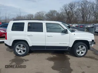 2014 Jeep Patriot Latitude with VIN 1C4NJRFB0ED778170, listed as a IAAI auction lot 41870418 with 54,624 mi miles. Bid and sale history available at carsss.com. Image 14.