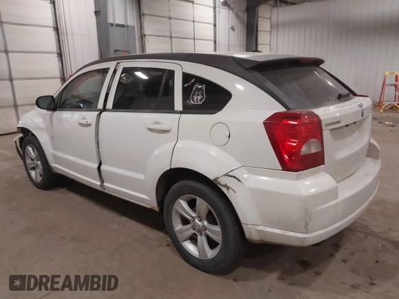 2010 Dodge Caliber SXT with VIN 1B3CB4HA3AD590654, listed as a IAAI auction lot 41814572 with 203,422 mi miles and . Bid and sale history available at DreamBid. Image 3.