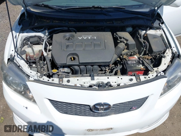 2009 Toyota Corolla with VIN 2T1BU40E49C157663, listed as a IAAI auction lot 42059139 with 135,685 mi miles. Bid and sale history available at carsss.com. Image 10.