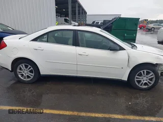 2006 Pontiac G6 6-Cyl z VIN 1G2ZG558364172091, wystawiony jako IAAI lot #42377332 z przebiegiem 199 495 mil mil oraz . Historia ofert i sprzedaży dostępna na DreamBid. Obrazek 13.
