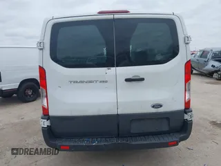 2015 Ford Transit Cargo with VIN 1FTNR1ZM0FKB02483, listed as a IAAI auction lot 41547400 with 317,720 mi miles and . Bid and sale history available at DreamBid. Image 14.