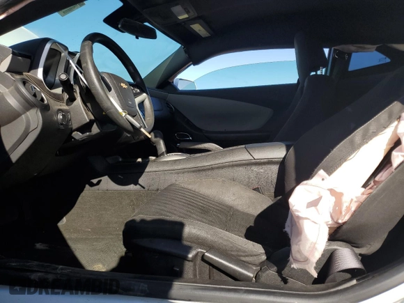 2013 Chevrolet Camaro LS z VIN 2G1FA1E39D9137510, wystawiony jako Copart lot #56770245 z przebiegiem 139 309 mil mil oraz Szkoda całkowita • Salvage title. Historia ofert i sprzedaży dostępna na DreamBid. Obrazek 7.