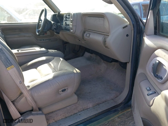 1997 Chevrolet Tahoe with VIN 1GNEK13RXVJ375189, listed as a IAAI auction lot 41959601 with 153,589 mi miles. Bid and sale history available at carsss.com. Image 5.