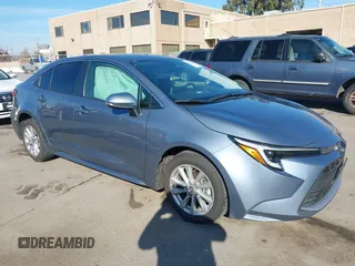 2023 Toyota Corolla Hybrid LE with VIN JTDBCMFEXP3006343, listed as a IAAI auction lot 41056503 with 121,690 mi miles. Bid and sale history available at carsss.com. Image 1.