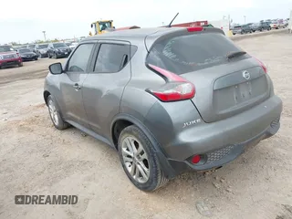 2015 Nissan Juke S with VIN JN8AF5MR8FT512769, listed as a IAAI auction lot 42102306 with 74,952 mi miles. Bid and sale history available at carsss.com. Image 3.