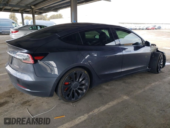2021 Tesla Model 3 Performance with VIN 5YJ3E1EC1MF074350, listed as a Copart auction lot 47434275 with 63,319 mi miles and Salvage Title. Bid and sale history available at DreamBid. Image 3.