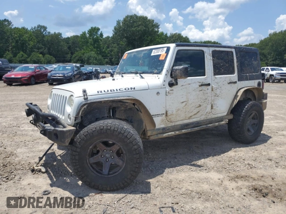 2015 Jeep Wrangler Unlimited Rubicon with VIN 1C4BJWFG6FL710993, listed as a Copart auction lot 62308195 with 103,938 mi miles and Salvage title. Bid and sale history available at DreamBid. Image 1.