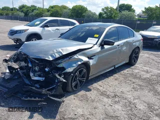 2019 BMW M5 Competition z VIN WBSJF0C50KB285924, wystawiony jako IAAI lot #41686677 z przebiegiem 44 238 mil mil oraz . Historia ofert i sprzedaży dostępna na DreamBid. Obrazek 2.