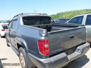 2009 Honda Ridgeline RTS with VIN 5FPYK16409B105186, listed as a IAAI auction lot 42003632 with 153,072 mi miles. Bid and sale history available at carsss.com. Image 3.