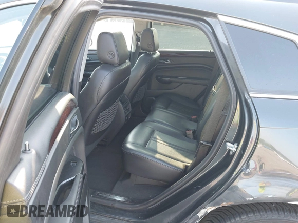 2014 Cadillac SRX Performance Collection with VIN 3GYFNFE35ES663320, listed as a IAAI auction lot 42480235 with 112,406 mi miles and . Bid and sale history available at DreamBid. Image 8.