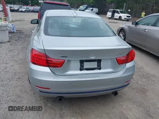 2014 BMW 4 Series 435i xDrive z VIN WBA3R5C54EF784725, wystawiony jako IAAI lot #42291673 z przebiegiem 107 124 mil mil oraz . Historia ofert i sprzedaży dostępna na DreamBid. Obrazek 17.