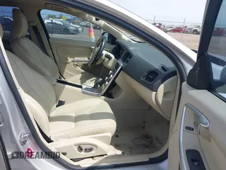 2015 Volvo S60 T5 Drive-E Premier with VIN YV140MFK5F1344597, listed as a IAAI auction lot 41822415 with 103,301 mi miles and . Bid and sale history available at DreamBid. Image 5.