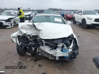 2016 Mercedes-Benz SLK 300 z VIN WDDPK3JA4GF123735, wystawiony jako IAAI lot #41559315 z przebiegiem Nie podano mil oraz . Historia ofert i sprzedaży dostępna na DreamBid. Obrazek 12.