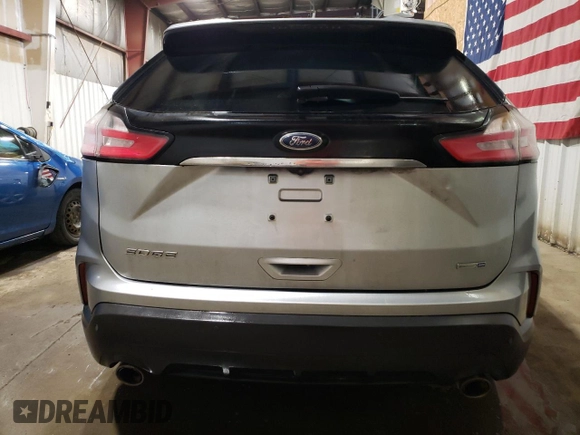 2020 Ford Edge SE с VIN 2FMPK4G91LBA14766, выставлен на аукционе Copart как лот 54425375 с пробегом 101 630 миль миль и Списание • Salvage title. История ставок и продаж доступна на DreamBid. Изображение 6.