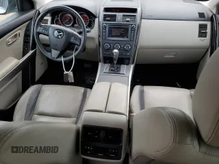 2012 Mazda CX-9 Grand Touring z VIN JM3TB2DA7C0358374, wystawiony jako Copart lot #58741885 z przebiegiem 127 162 mil mil oraz Czysty tytuł • Clean title. Historia ofert i sprzedaży dostępna na DreamBid. Obrazek 8.