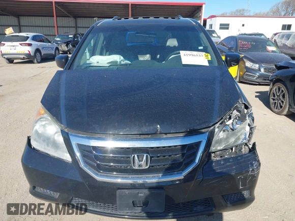 2010 Honda Odyssey EX-L with VIN 5FNRL3H67AB063205, listed as a IAAI auction lot 41996537 with 146,327 mi miles and . Bid and sale history available at DreamBid. Image 12.