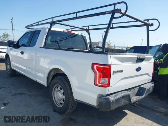 2015 Ford F-150 XL with VIN 1FTEX1C89FFC78555, listed as a IAAI auction lot 41989102 with 216,655 mi miles. Bid and sale history available at carsss.com. Image 3.