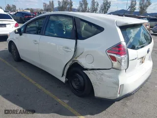2017 Toyota Prius v Two with VIN JTDZN3EU9HJ063285, listed as a IAAI auction lot 41696704 with 411,285 mi miles. Bid and sale history available at carsss.com. Image 3.