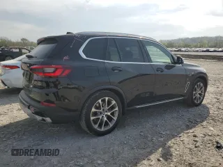 2023 BMW X5 xDrive45e z VIN 5UXTA6C03P9P26996, wystawiony jako Copart lot #53747565 z przebiegiem 52 599 mil mil oraz Szkoda całkowita • Salvage title. Historia ofert i sprzedaży dostępna na DreamBid. Obrazek 3.