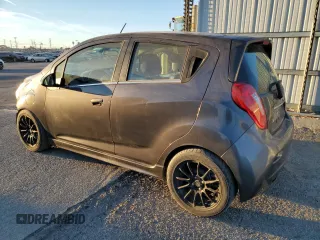 2014 Chevrolet Spark EV LT with VIN KL8CL6S09EC413313, listed as a Copart auction lot 85750614 with 50,618 mi miles and Salvage Title. Bid and sale history available at carsss.com. Image 2.