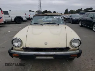 1980 FIAT 124 Spider z VIN 124CS000165091, wystawiony jako Copart lot #72478654 z przebiegiem 10 397 mil mil oraz Czysty tytuł • Clean title. Historia ofert i sprzedaży dostępna na DreamBid. Obrazek 5.