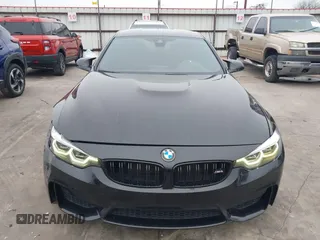 2019 BMW M4 with VIN WBS4Y9C53KAH82910, listed as a IAAI auction lot 41570315 with 59,227 mi miles. Bid and sale history available at carsss.com. Image 21.
