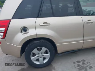 2006 Suzuki Grand Vitara XSport z VIN JS3TD944064102663, wystawiony jako IAAI lot #42489072 z przebiegiem 128 759 mil mil oraz . Historia ofert i sprzedaży dostępna na DreamBid. Obrazek 6.