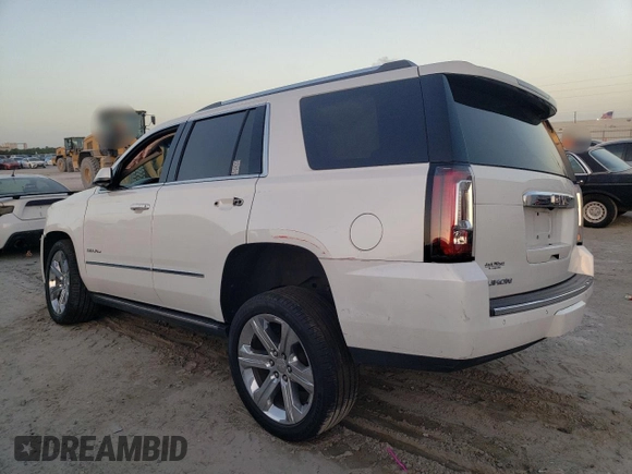 2019 GMC Yukon Denali with VIN 1GKS1CKJ9KR322958, listed as a Copart auction lot 79485874 with 86,512 mi miles and Salvage Title. Bid and sale history available at carsss.com. Image 2.