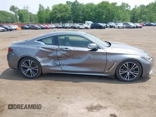 2020 Infiniti Q60 Luxe with VIN JN1EV7EKXLM340458, listed as a IAAI auction lot 42450765 with 64,048 mi miles and . Bid and sale history available at DreamBid. Image 13.